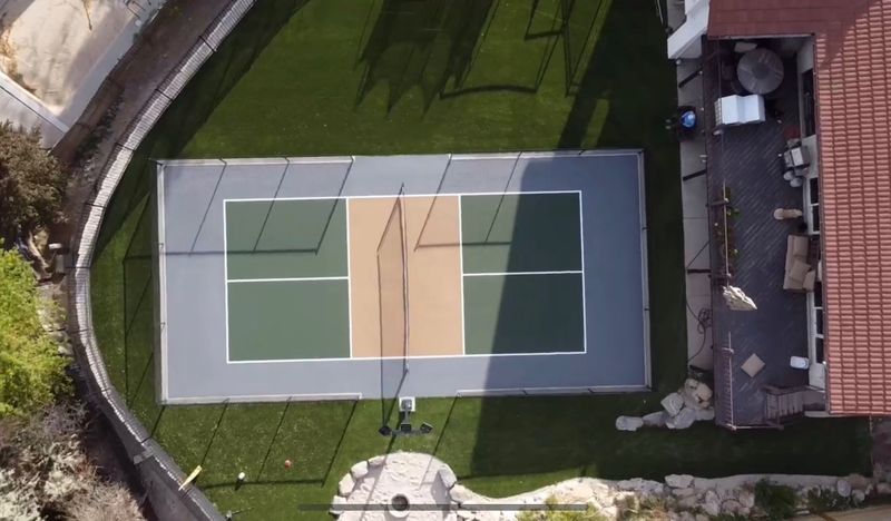 Aerial Drone View of Backyard Multi-Sport Tennis and Pickleball Court by Precision Pro Courts